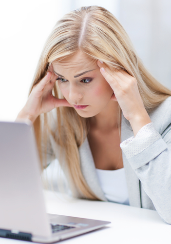 stressed woman with laptop
